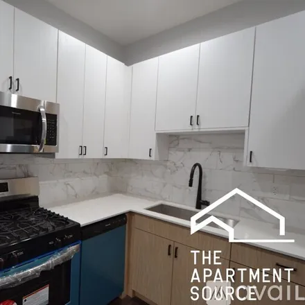 Rent this 3 bed apartment on 2171 W Wilson Ave