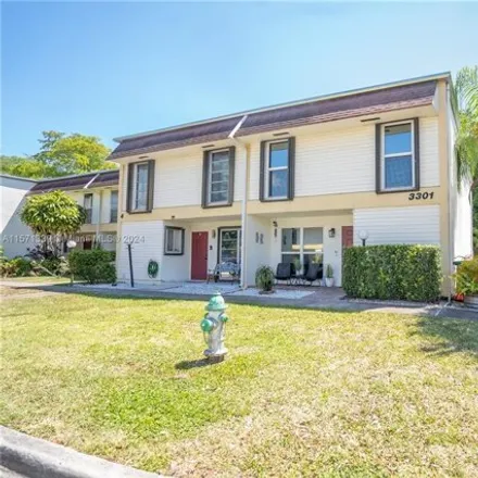 Buy this 3 bed townhouse on 3307 Raleigh Street in Hollywood, FL 33021