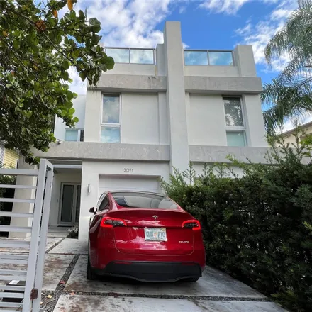 Rent this 3 bed townhouse on 3071 Orange Street in Ocean View Heights, Miami