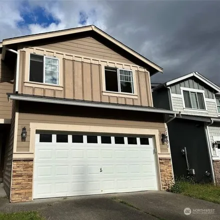 Buy this 4 bed house on 11701 9th Avenue Ct E in Tacoma, Washington