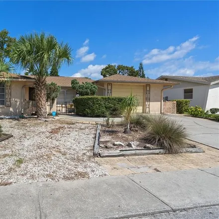 Buy this 2 bed house on 7315 San Salvadore Drive in Jasmine Estates, FL 34668