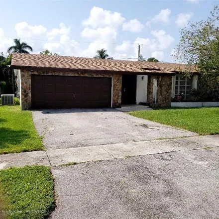 Buy this 4 bed house on 11875 West Sunrise Boulevard in Sunrise, FL 33323