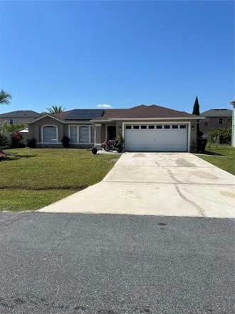 Buy this 3 bed house on 634 Parakeet Court in Polk County, FL 34759
