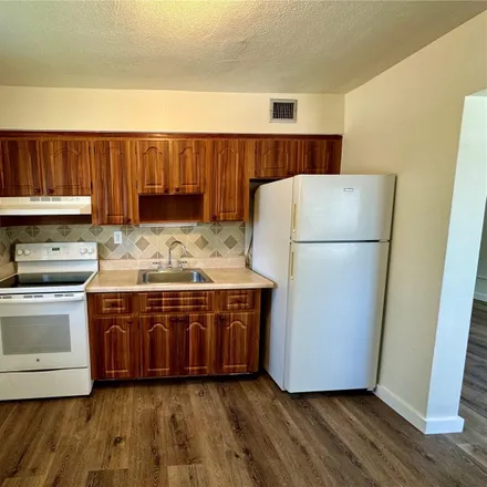 Rent this 2 bed apartment on 4080 Southwest 2nd Terrace