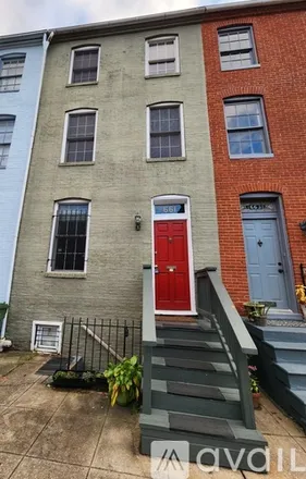 Rent this 4 bed townhouse on 661 Portland St