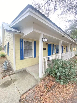 Rent this 2 bed townhouse on 646 East Duffy Street in Savannah, GA 31401