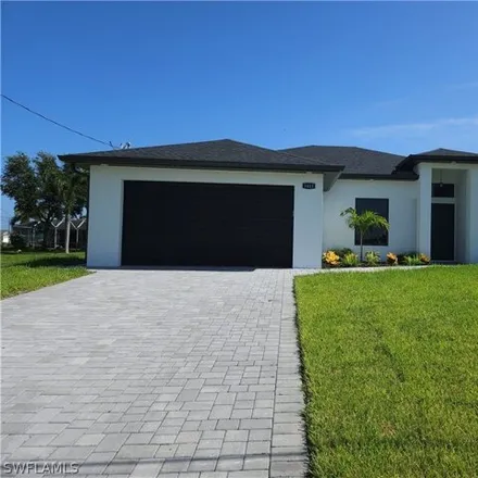 Buy this 4 bed house on 1413 NW 9th Ter in Cape Coral, Florida