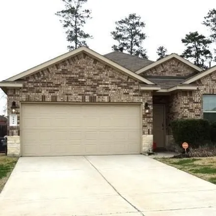 Rent this 4 bed house on 9858 Laurel Lake Drive in Montgomery County, TX 77384