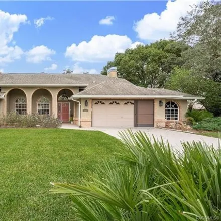 Buy this 3 bed house on 12319 Knotty Pine Court in Spring Hill, FL 34609