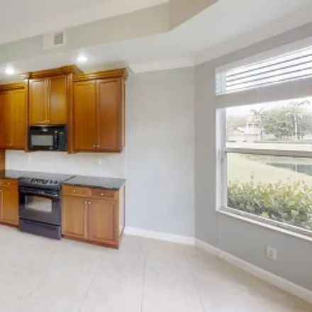 Buy this 3 bed apartment on #102,3512 Cherry Blossom Court in Meadows of Estero, Estero