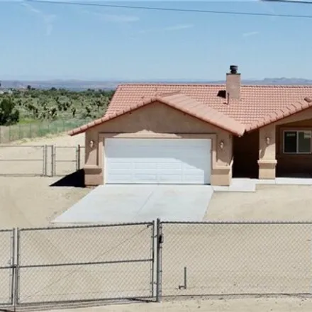 Buy this 4 bed house on 3751 White Fox Trail in Phelan, CA 92371
