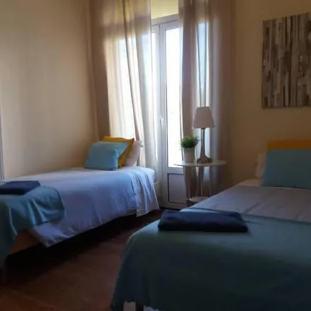 Rent this 4 bed room on A Ritinha in Avenida António Augusto de Aguiar, 1050-022 Lisbon