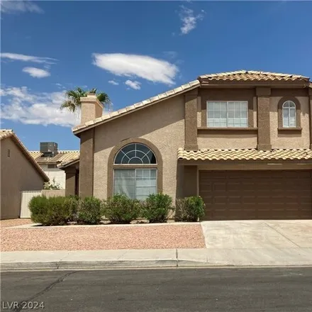Rent this 4 bed house on 967 Derringer Ln in Henderson, Nevada