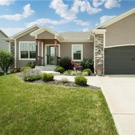 Buy this 5 bed house on 1458 Northwest Red Oak Court in Grain Valley, MO 64029