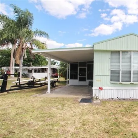 Buy this 2 bed house on 3276 Southeast 25th Street in Taylor Creek, Okeechobee County