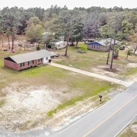 Buy this 4 bed house on 130 Bob McCaskill Drive in DeFuniak Springs, FL 32433