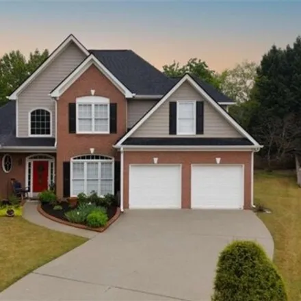 Buy this 4 bed house on 2499 Windrush Court in Gwinnett County, GA 30017