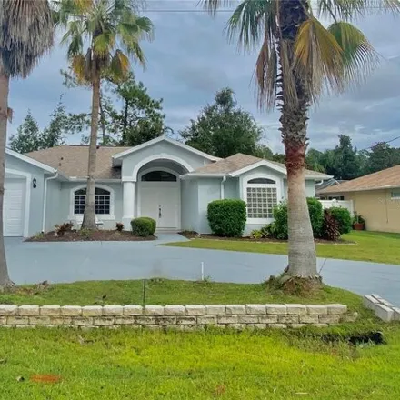 Buy this 3 bed house on 78 Wood Haven Dr in Palm Coast, Florida