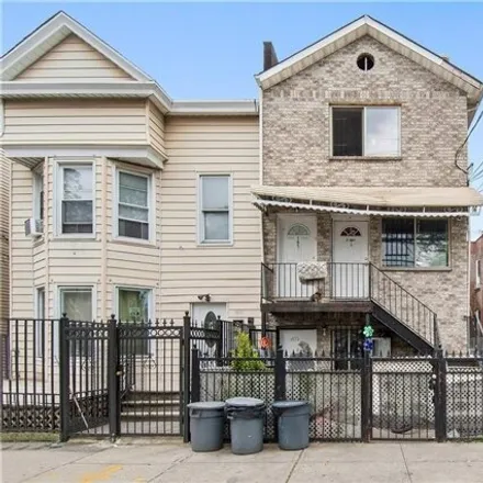 Buy this 9 bed house on 1653 Garfield Street in New York, NY 10460