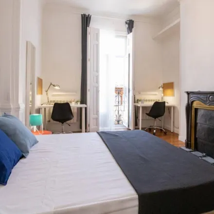 Rent this 11 bed room on Calle de Fuencarral in 36, 28004 Madrid