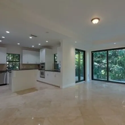 Rent this 6 bed apartment on 3670 South Douglas Road in Irvington, Coconut Grove