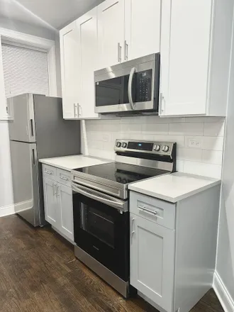 Rent this 3 bed apartment on 1214 West Rosemont Avenue