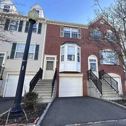 Rent this 2 bed townhouse on 87 Locust Street in Jersey City, NJ 07305