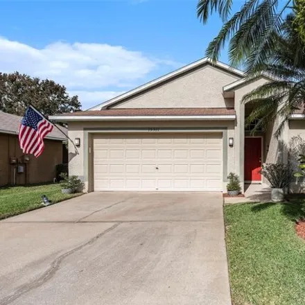 Buy this 3 bed house on 15523 Lake Bella Vista Drive in Citrus Park, FL 33625