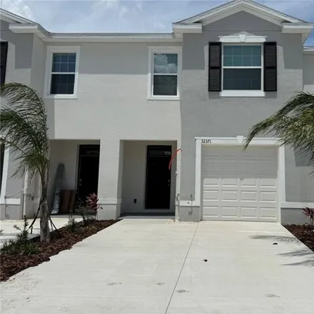 Rent this 3 bed house on Turtle Grace Loop in Pasco County, FL 33545