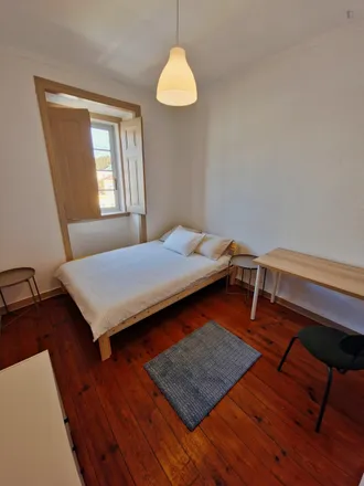 Rent this 4 bed room on Rua da Glória 66-68 in 1250-115 Lisbon, Portugal