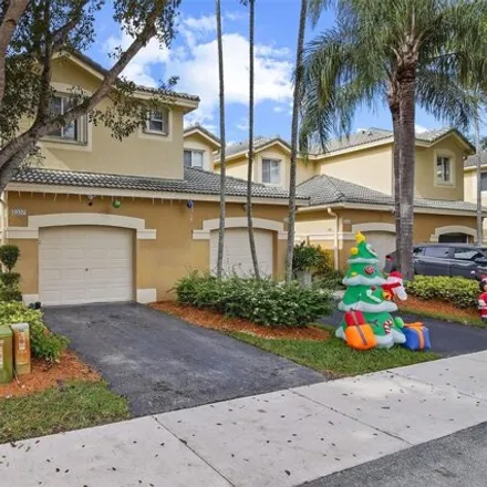 Buy this 4 bed townhouse on 2337 Pasadena Way in Weston, FL 33327