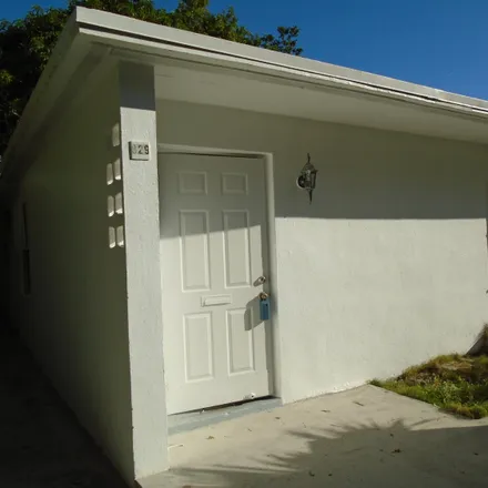 Buy this 1 bed house on 829 Macy Street in West Palm Beach, FL 33405