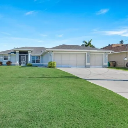 Buy this 4 bed house on 413 SE 13th St in Cape Coral, Florida