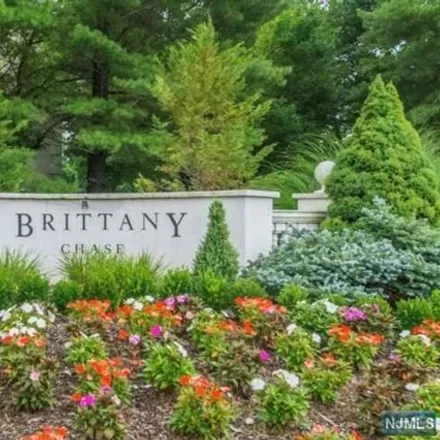 Buy this 2 bed condo on Brittany Drive in Wayne, NJ 07470