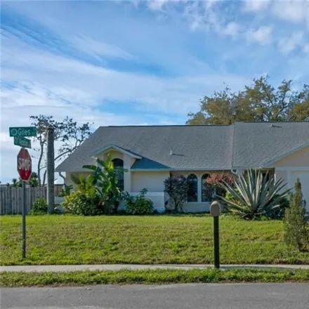 Buy this 4 bed house on 1857 Giles Street in Deltona, FL 32725