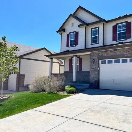 Rent this 4 bed house on 21128 East Layton Lane in Aurora, CO 80015