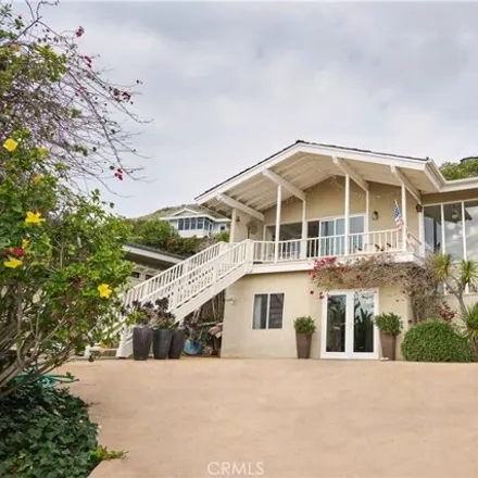 Rent this 4 bed house on 10 North Vista de la Luna in Three Arch Bay, Laguna Beach