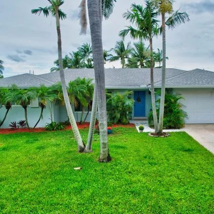 Buy this 3 bed house on 1036 Southwest 26th Avenue in Chapel Hill, Boynton Beach