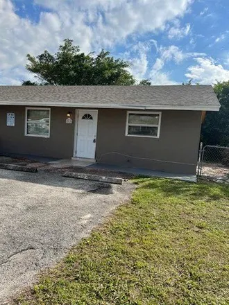 Rent this 2 bed house on 5904 Orange Road in West Palm Beach Farms, Palm Beach County