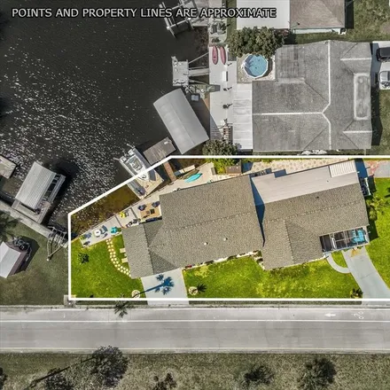 Buy this 4 bed house on 6537 Beach Boulevard in Hudson, FL 34667