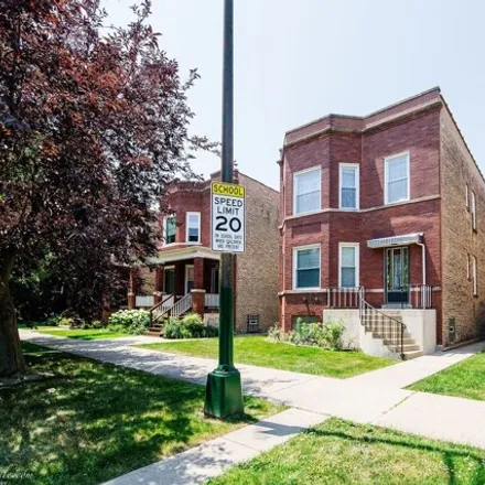 Buy this 4 bed house on 3818 N Central Park Ave in Chicago, Illinois