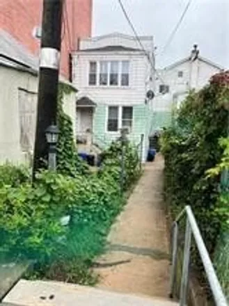 Buy this 3 bed house on 153 28th Avenue in New York, NY 11214