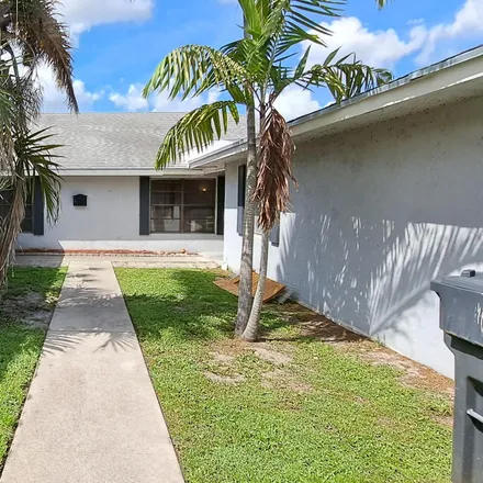 Rent this 2 bed duplex on 1311 The 12th Fairway in Wellington, Palm Beach County