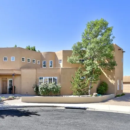 Buy this 3 bed house on 1700 Via de Luna Northeast in Albuquerque, NM 87110