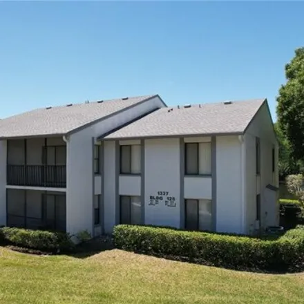 Buy this 2 bed condo on 1327 Pine Ridge Circle East in East Lake, FL 34688