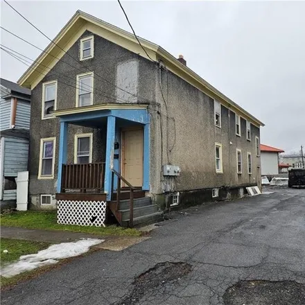 Buy this 4 bed house on 740 Jay Street in City of Utica, NY 13501