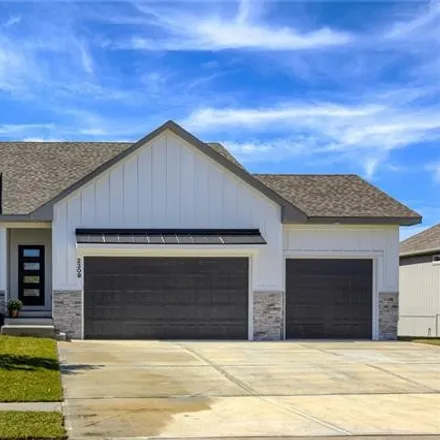 Buy this 3 bed house on 2002 Ridge Tree Lane in Pleasant Hill, MO 64080