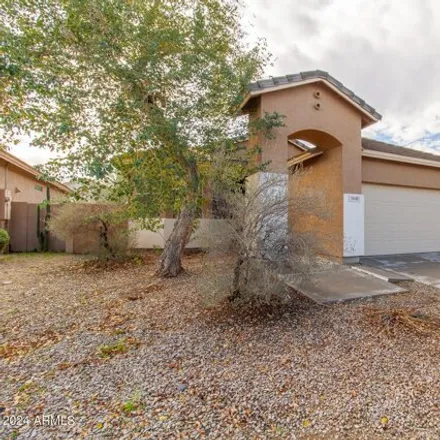 Rent this 3 bed house on 5641 West Vineyard Road in Phoenix, AZ 85339