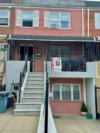 Buy this 4 bed house on 23-67 93rd Street in New York, NY 11369