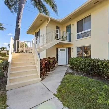 Buy this 2 bed condo on 100 Glades Blvd Apt 3 in Naples, Florida